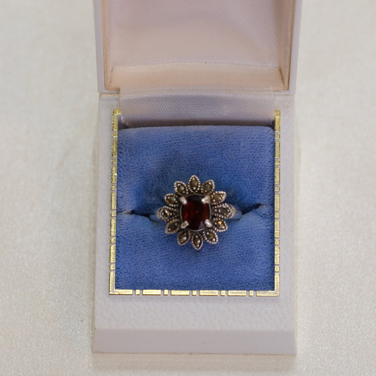Silver Floral Motif Ring with Garnet