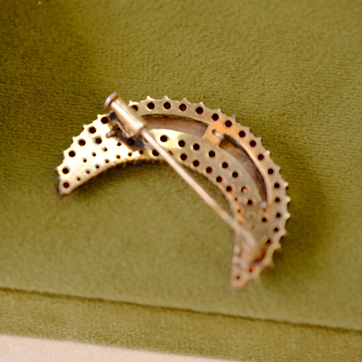 Victorian garnet and pearls crescent brooch signed 900