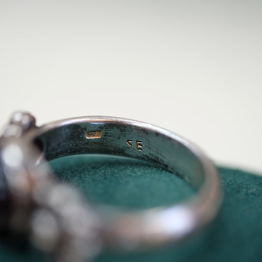 Round Garnet Ring with Floral Setting