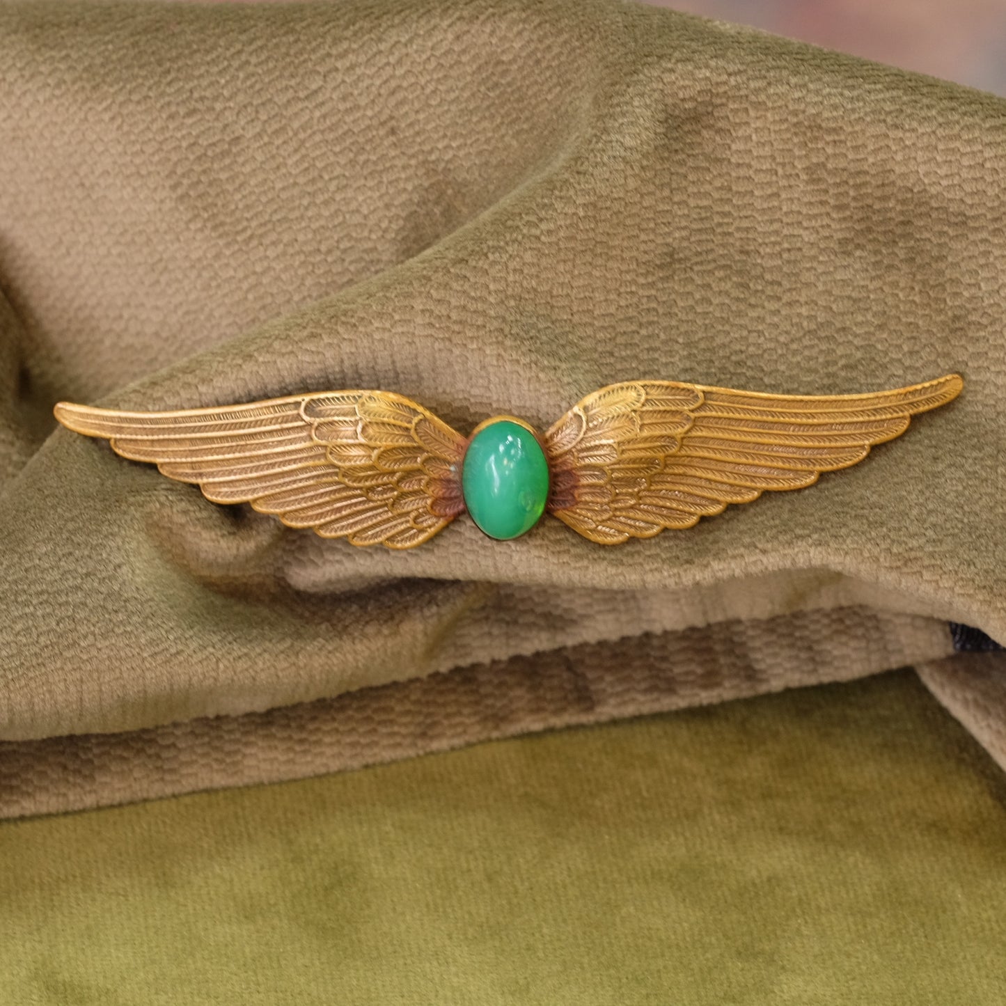 Victorian Wing with green cabochon 1910s