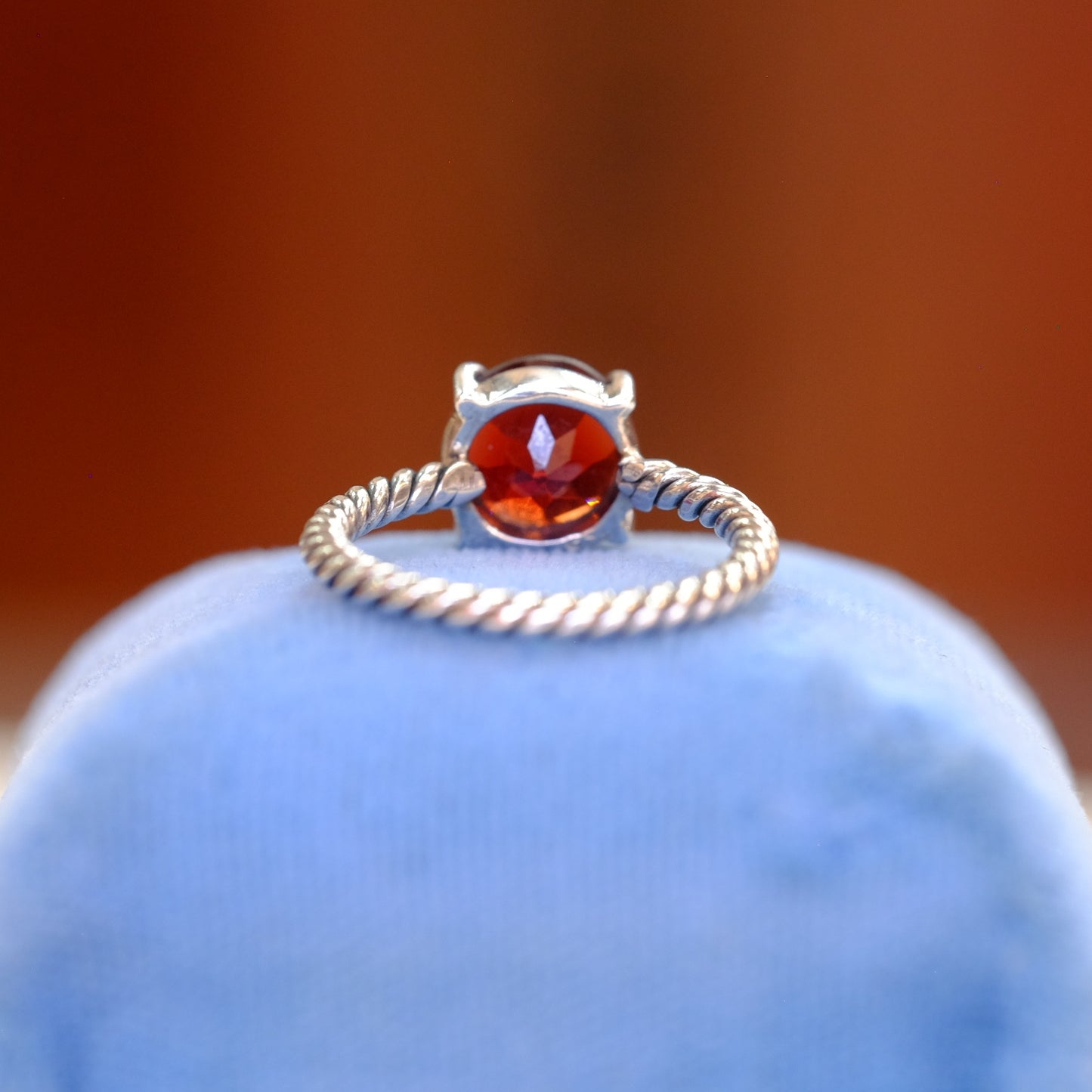 Silver Garnet Ring on Spiral Band