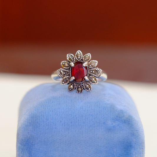 Silver Floral Motif Ring with Garnet