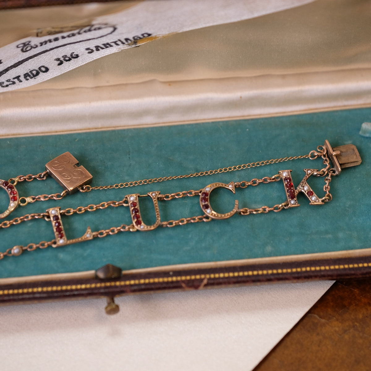 10K Gold Victorian Good Luck bracelet with garnets and pearls