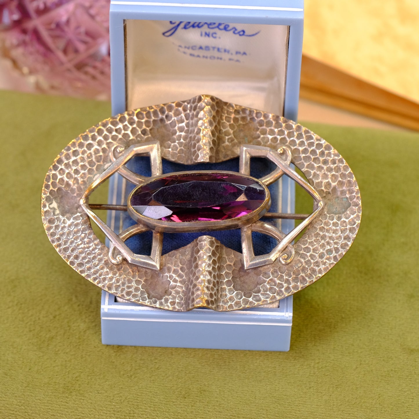 Early Sash Brooch hammered silver with purple glass