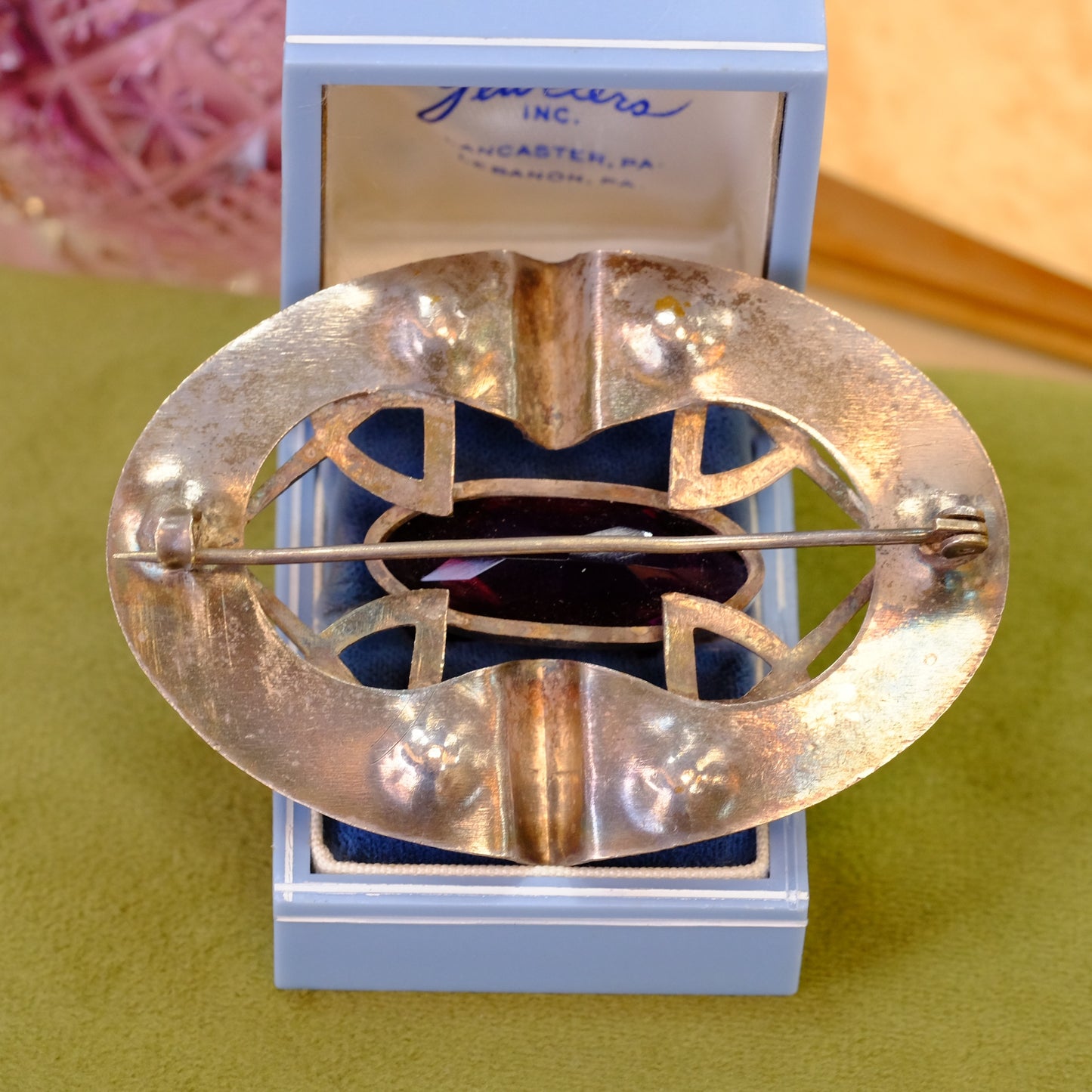 Early Sash Brooch hammered silver with purple glass