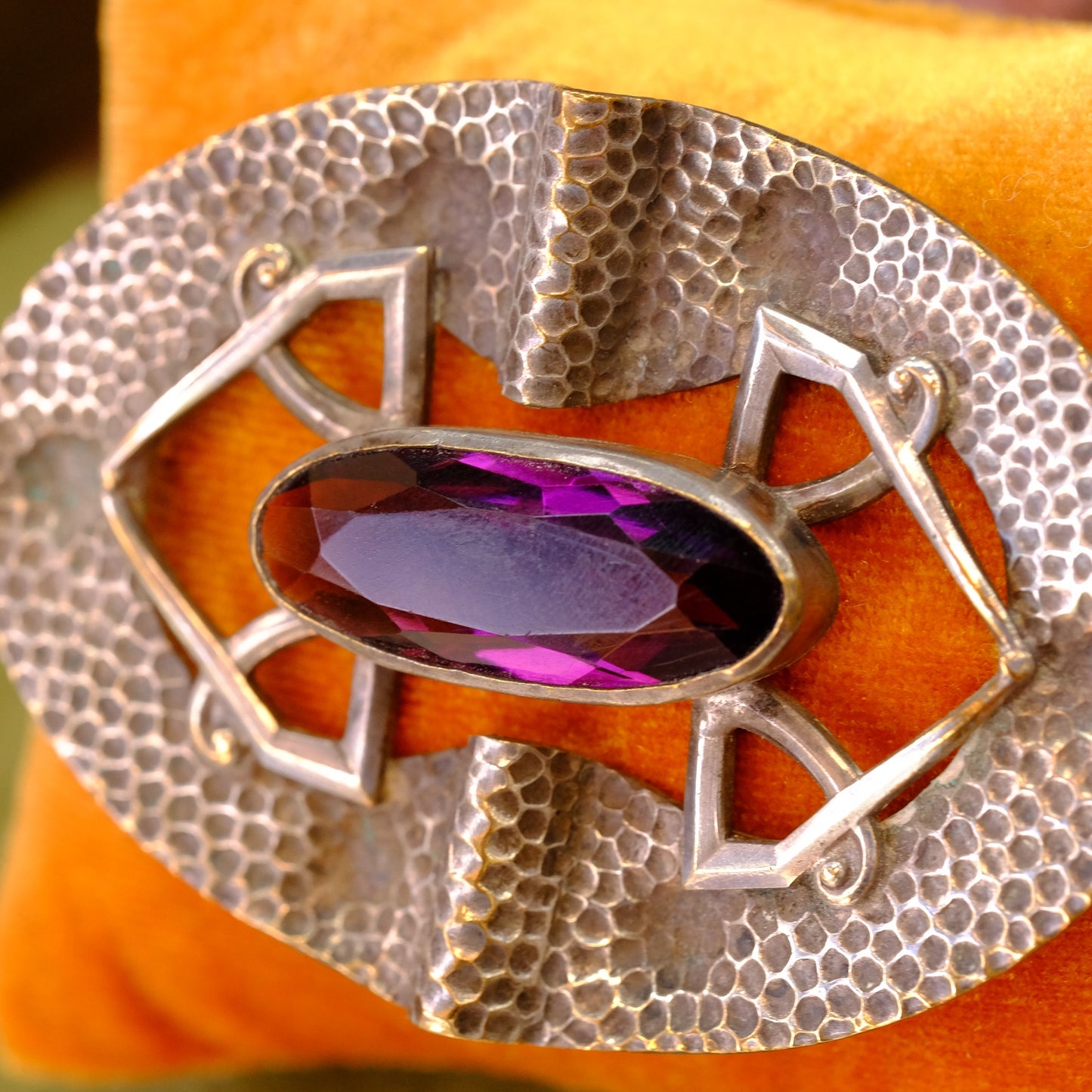 Early Sash Brooch hammered silver with purple glass