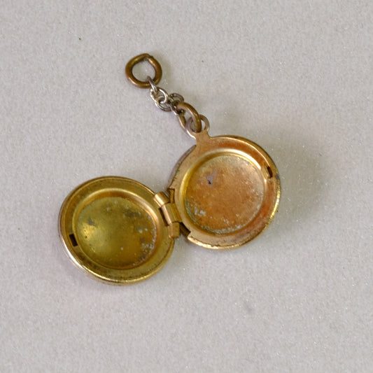 Vintg etched round locket
