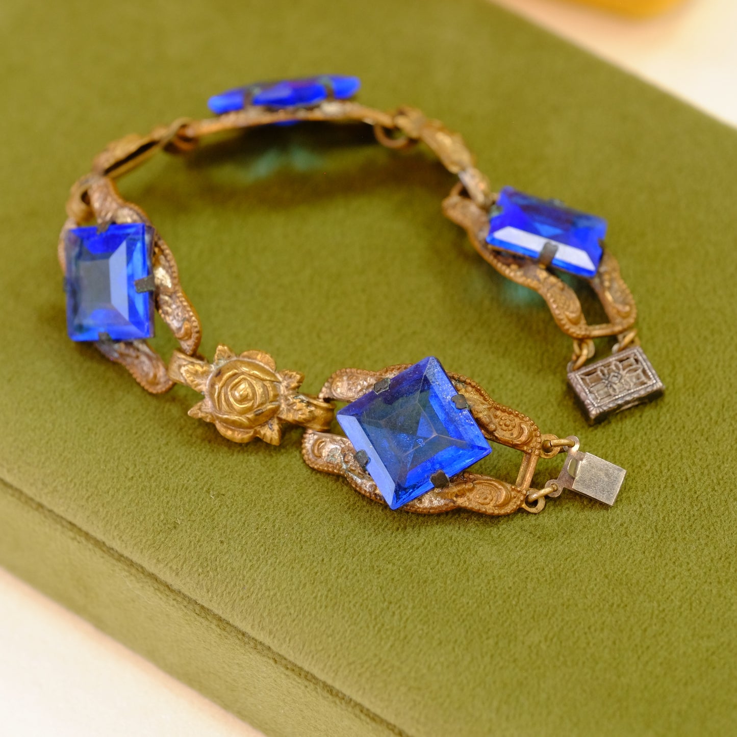 Early Century Brass Rose and Blue Stone Bracelet