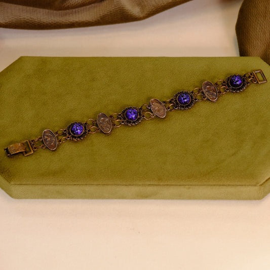 Pewter Filigree Bracelet with Cameos and Purple Stones