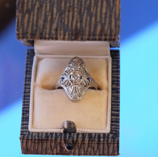 Art Deco Platinum and 14K Gold Diamond Ring with accented sapphires