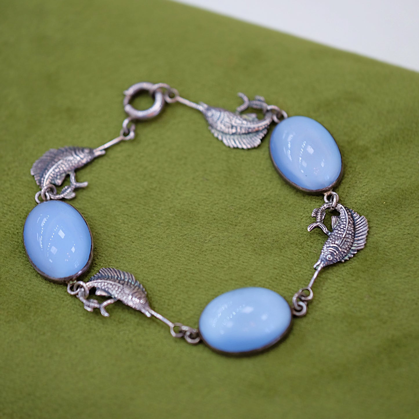 Sterling blue cab figural fish bracelet